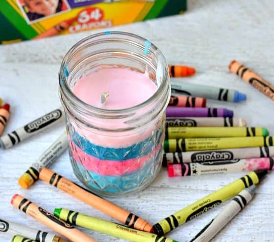 Turn old crayons into a new colorful candle! Perfect craft for kids to help!