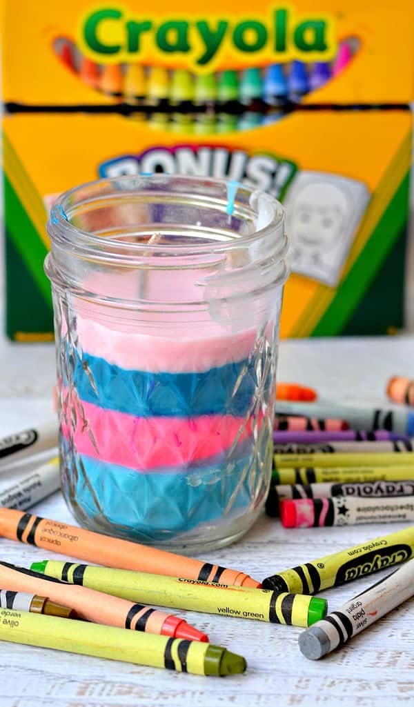 Turn old crayons into a new colorful candle! Perfect craft for kids to help!