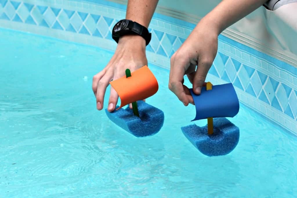 Great summer kids craft! You can make these quick and easy pool noodle boats in just a few minutes and the kids will play with them for hours!
