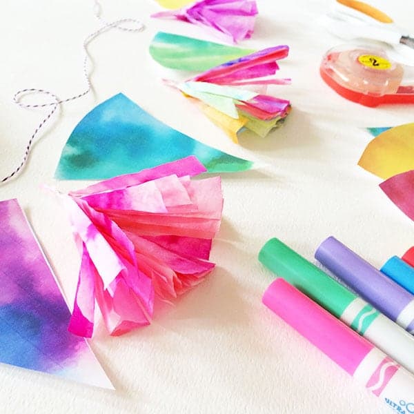 How to make watercolor rainbow tassles! My kids would love this easy craft!