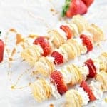 Light and airy puff pastry layered on top of fresh strawberries and whipped cream. These strawberry shortcake kabobs are a light dessert for summer parties.