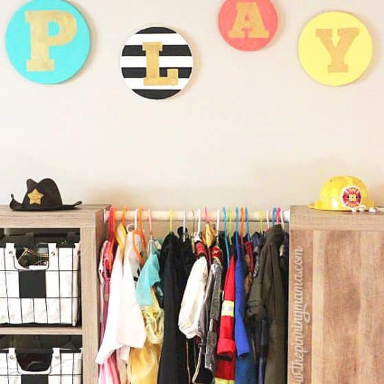 DIY Playroom sign - You will NOT believe what this is made of. Genius!
