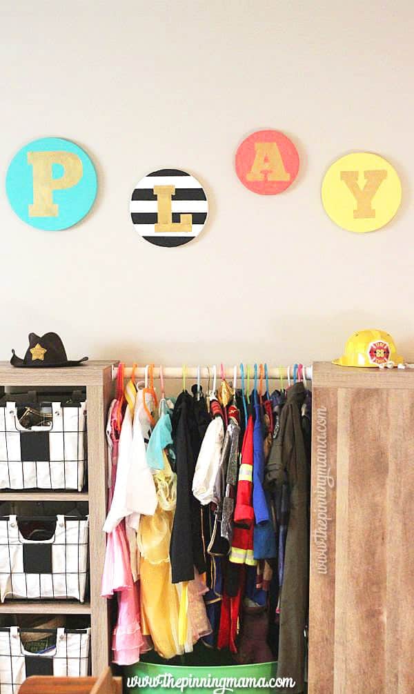 DIY Playroom sign - You will NOT believe what this is made of. Genius!