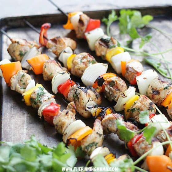 Paleo Fajita Kabobs on the grill. This is perfect for when we have company because everyone can customize their own!