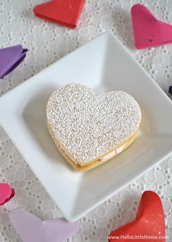These Heart Sandwich Cookies with White Chocolate Cream Cheese Filling are an irresistible Valentine's Day treat! | Hello Little Home