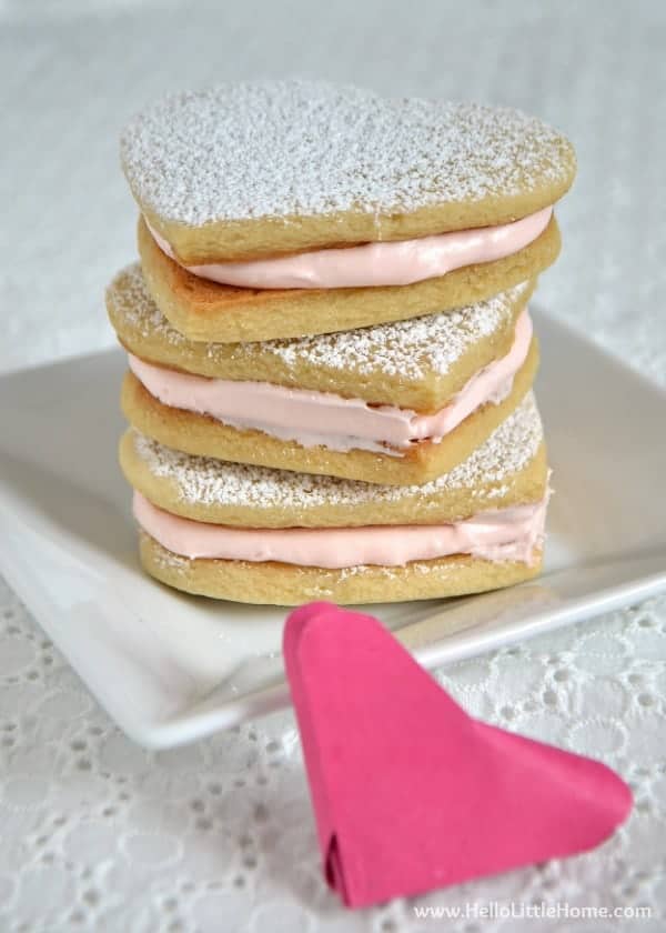 These Heart Sandwich Cookies with White Chocolate Cream Cheese Filling are an irresistible Valentine's Day treat! | Hello Little Home