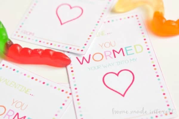 These Valentine’s Day Classroom Favors are the cutest! Print out the free printable Valentine’s Day card and put a smile on every kid’s face with this gummy worm valentine.