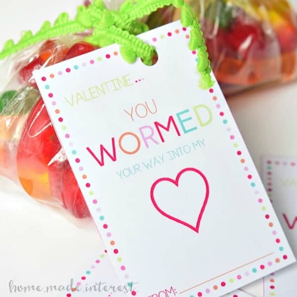 These Valentine’s Day Classroom Favors are the cutest! Print out the free printable Valentine’s Day card and put a smile on every kid’s face with this gummy worm valentine.
