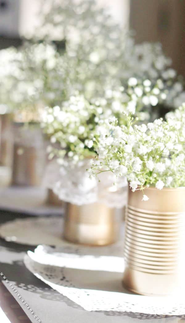 Perfect DIY idea for a vintage or shabby chic wedding!  These gold and lace tin cans are stunning and EASY to make!