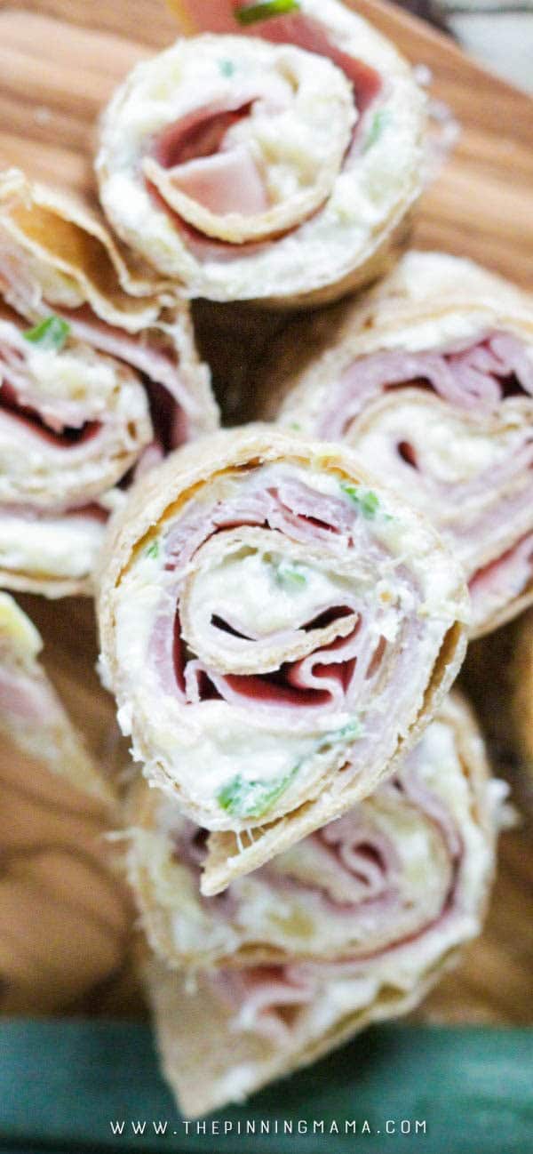 Easiest and tastiest appetizer recipe! Ham Pineapple and cream cheese all wrapped up in a bite sized treat! I have to make extras or my kids and husband eat them all before I can finish making them!