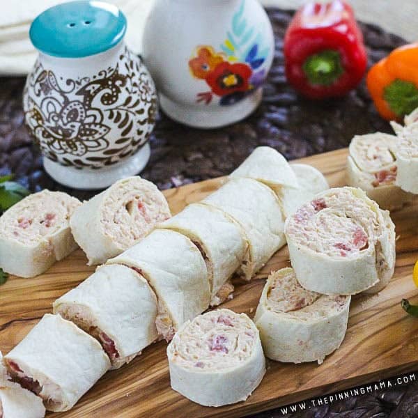 Creamy Taco Roll Ups recipe - This makes a great appetizer idea and is ONLY 5 INGREDIENTS and takes just a few minutes to put together.  Perfect for game day, tailgates or even for something fun to put into a lunchbox for school or work.
