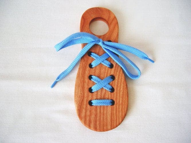 10+ Beautiful Handmade Baby Gifts: Wooden Lacing Toy | www.thepinningmama.com