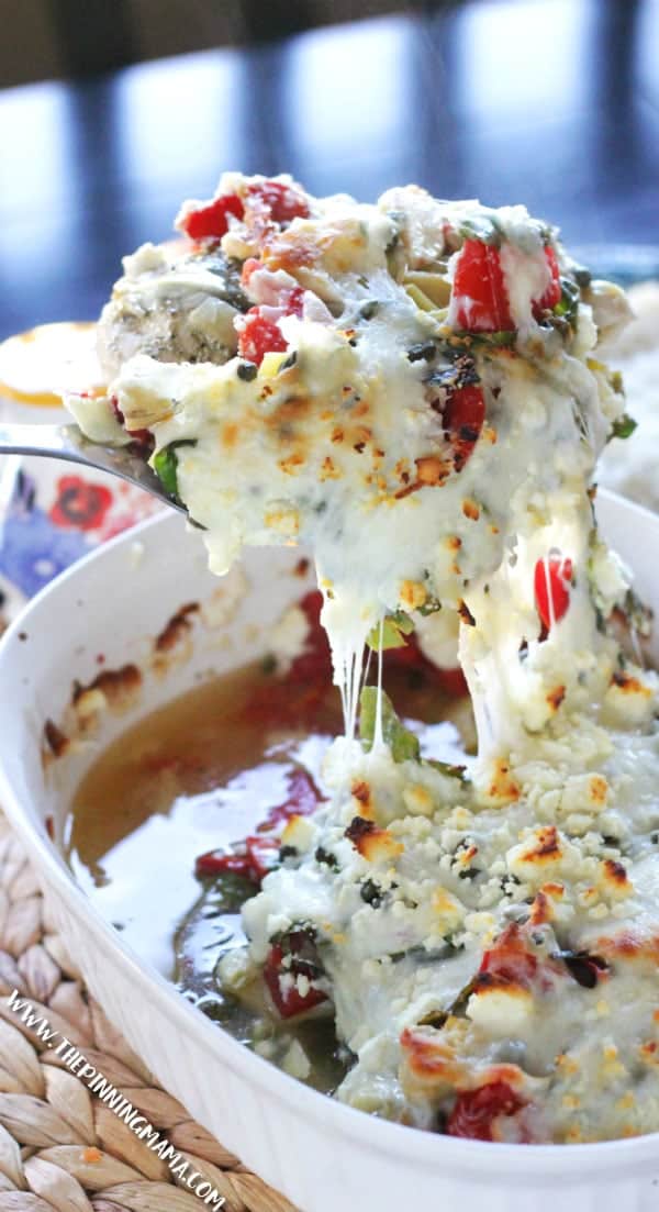 Spinach, artichoke, tomatoes, lemon, and feta all baked over chicken - Mediterranean Chicken Bake is so easy to make and clean up in only one dish! This recipe always impresses guests but is super simple to prep and get ready for a busy weeknight too!