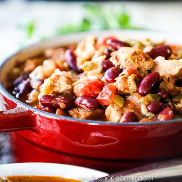 Chili with Chicken and Beans Recipe - The perfect homemade chili recipe packed with tomatoes, chicken breast, green chilis, beans, bell pepper and onion and rich broth!