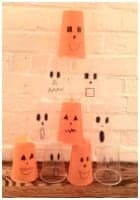 kids bowling with pumpkins/ghosts