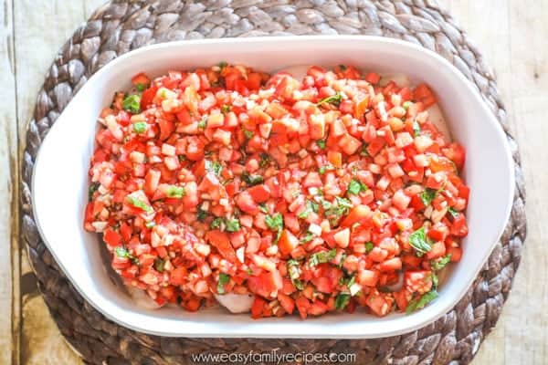 Cover chicken with Bruschetta mix - Bruschetta Chicken Bake Step 3
