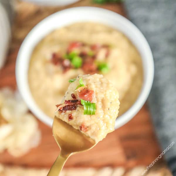 Whole30 Cauliflower Soup topped with bacon and green onion