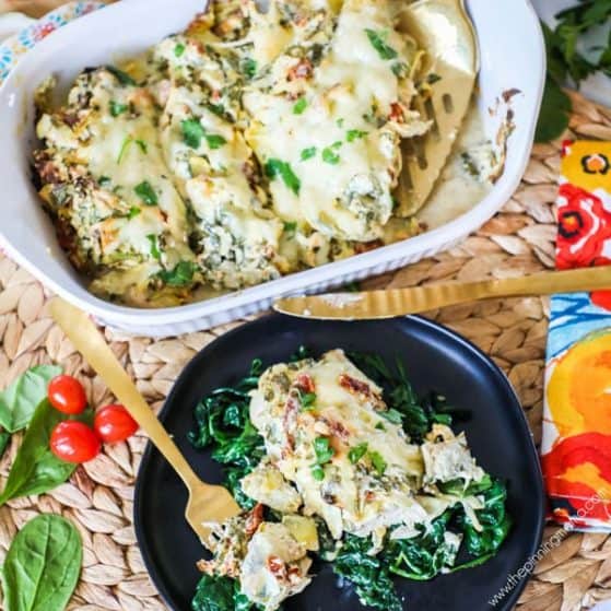 Tuscan Chicken served on Spinach