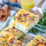 Easy Breakfast Casserole with Bacon being served on a spatula