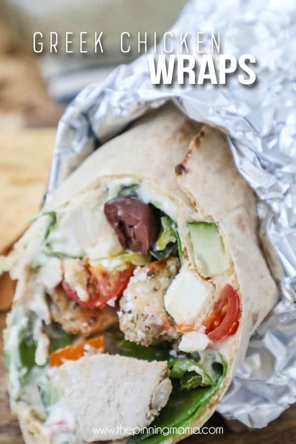Best Greek Chicken Wraps wrapped in foil and opened up