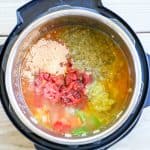 Chicken Fajita Soup Step 2: Add fajita seasoning, broth, salsa, tomato paste, tomatoes, and green chiles to the pot and mix well.