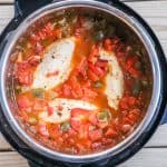 Chicken Fajita Soup Step 3: Place the chicken breasts in the pot and put them down until covered with the liquid.