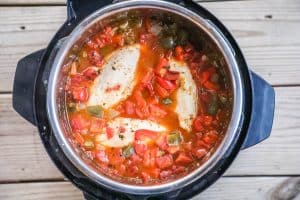 Chicken Fajita Soup Step 3: Place the chicken breasts in the pot and put them down until covered with the liquid.