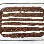 Step 2: Spread lines of cream cheese lengthwise down the brownie pan